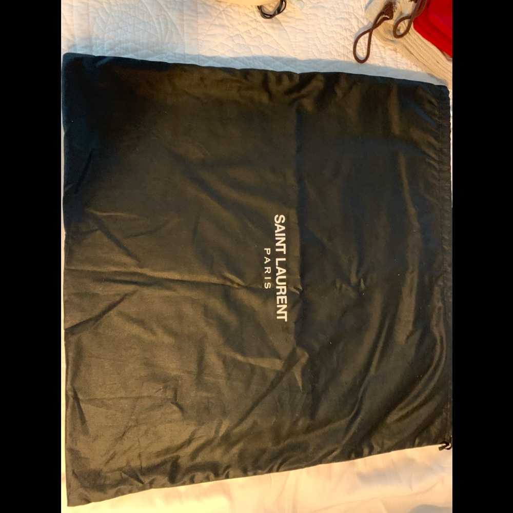 One large Saint Laurent dust bag from a Hand bag